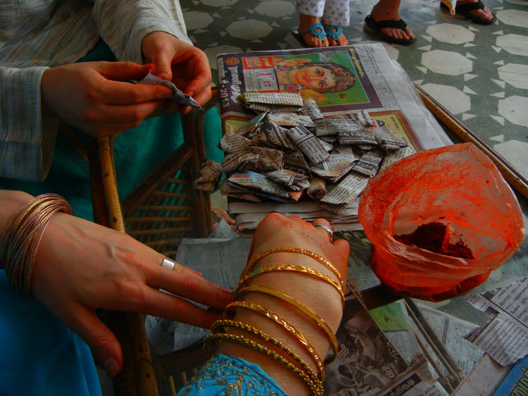 Making packages of Tillai Kali kumkum